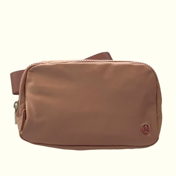 lululemon athletica Handbags - LULULEMON Light Pink Waist Bag Sling Bag Brand New With Tag